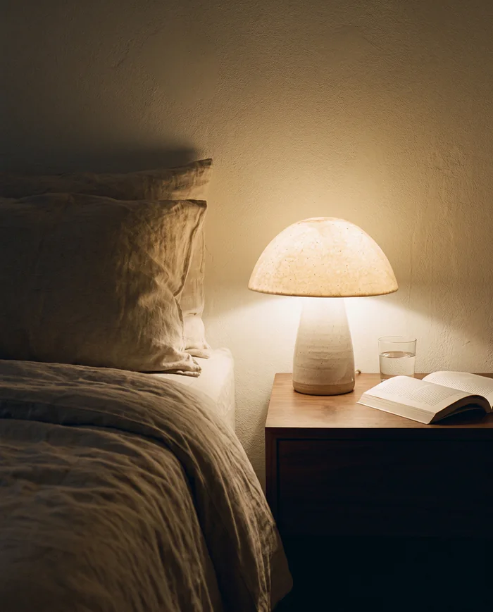 Cap at home: on a walnut bedside table, 10 pm