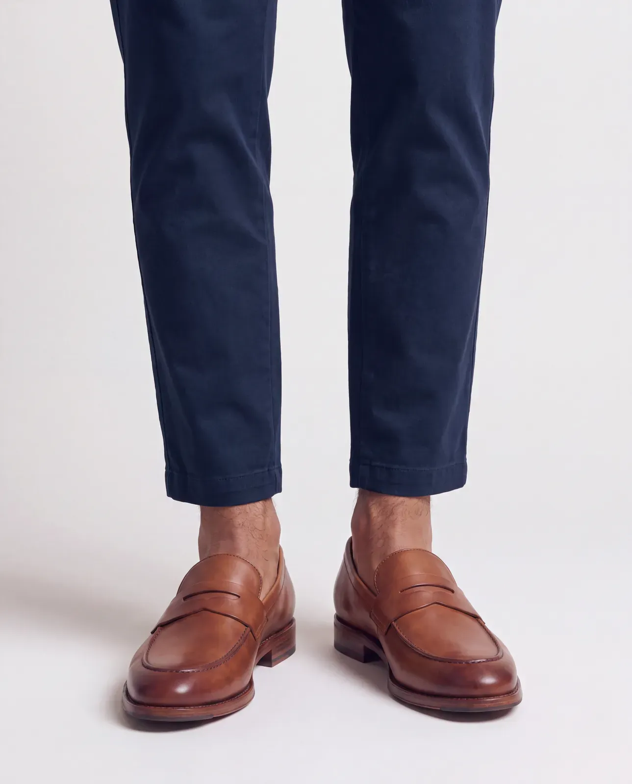 On foot, with trousers